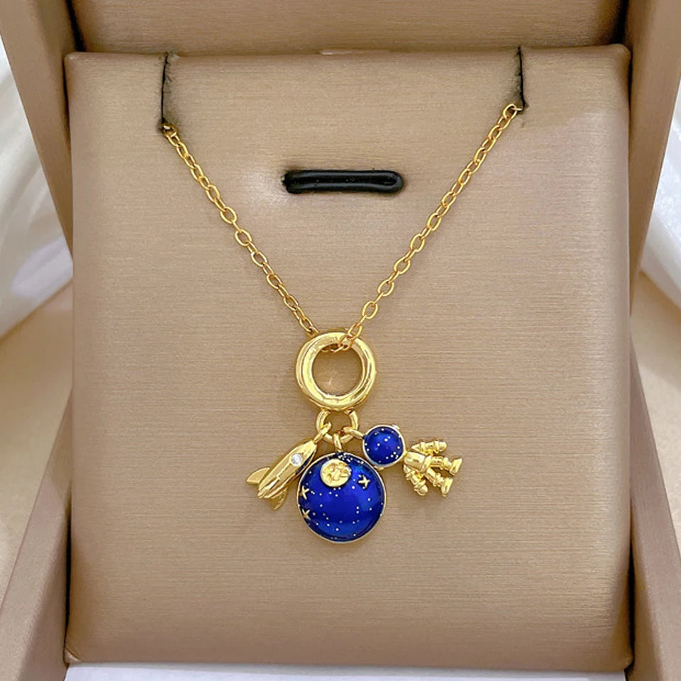 DaniLuxe “Starlight Voyage” Pendant Necklace – Moon, Planet & Astronaut Design