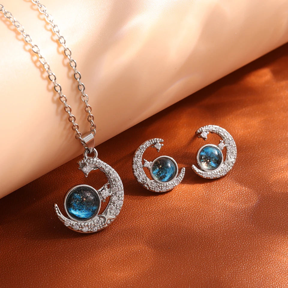 DaniLuxe “Starlight Voyage” Pendant Necklace – Moon, Planet & Astronaut Design