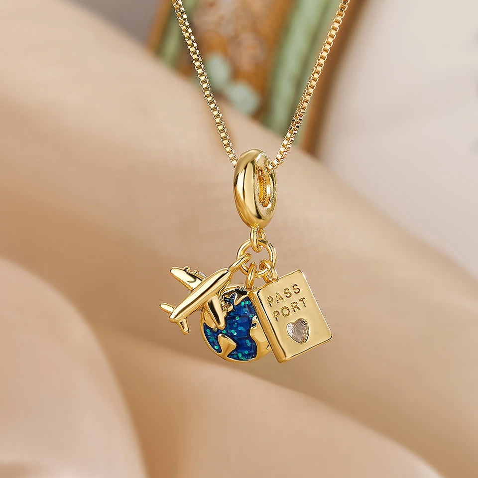 DaniLuxe “Starlight Voyage” Pendant Necklace – Moon, Planet & Astronaut Design